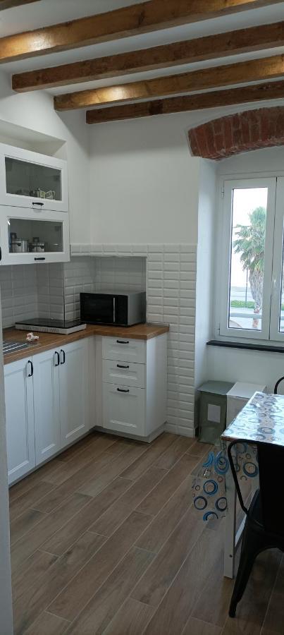A Un Passo Dal Mare Cin Ito1Oo59C29Zgy7Fln Apartment รีวาตรีโกโซ ภายนอก รูปภาพ